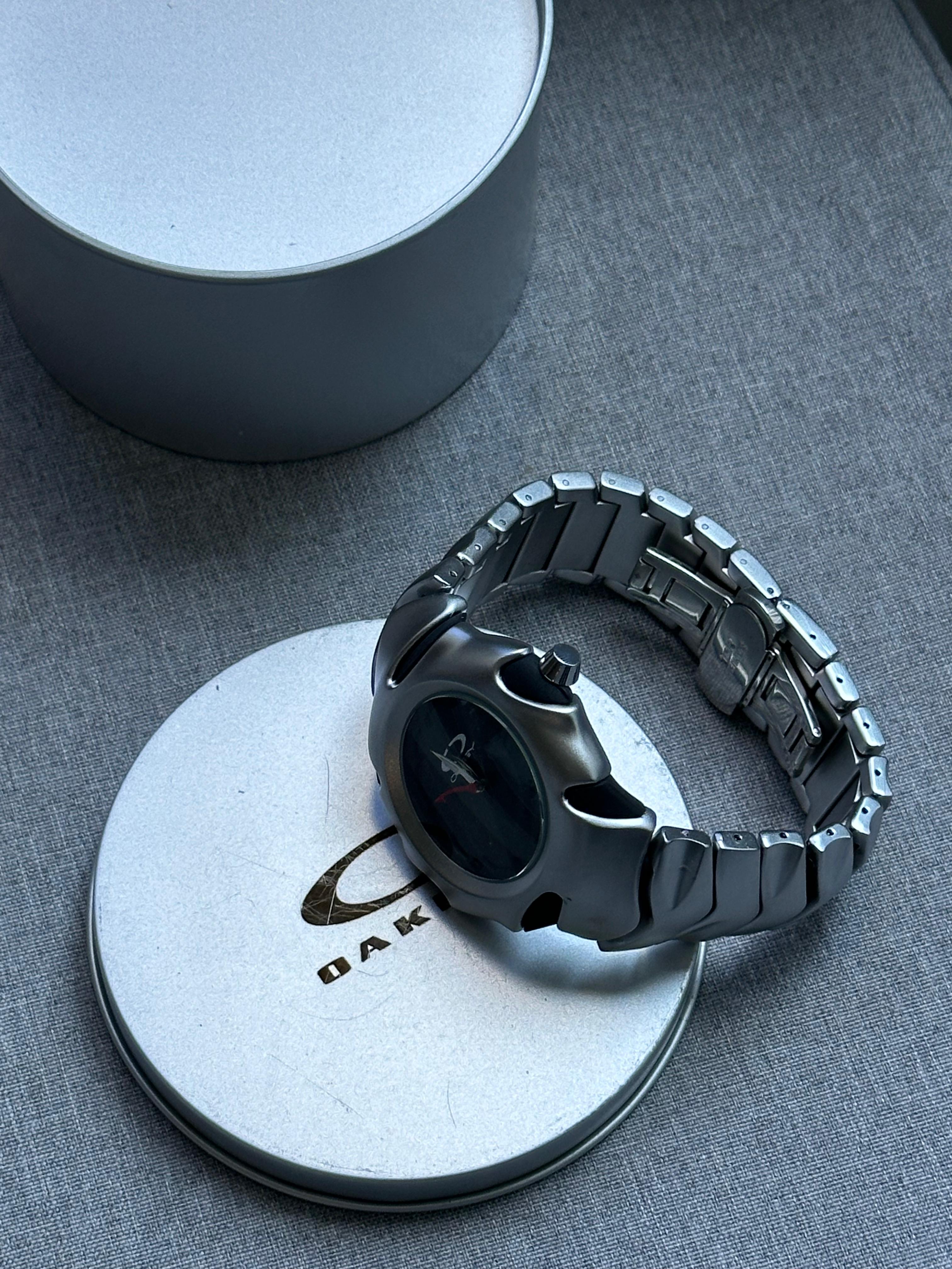 Oakley Blade Watch: Silver brushed Stainless Steel with Black Dial, Swiss Movement